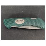 Sabre green plastic case pocket knife w/ fish