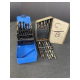 Variety of twist drill bits in 2 containers, both