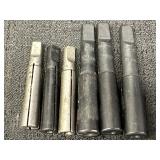 Taper drill collets and drill sleeve adapters.