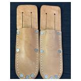 2 leather sheathes for carrying tools like pruning