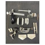 Variety of machinist tools- Vise, cutter, etc.