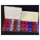 2 tins, 1-1/4in & 1-7/16in storage containers,