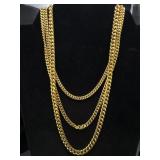 Monet 3 strand gold toned necklace