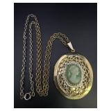 Gold Tone Green Cameo Locket