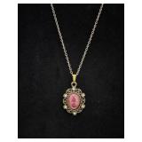 Sarah Coventry Gold Tone Pink Hidden Rose Pendant