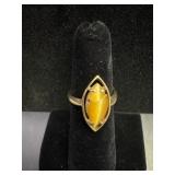 Marked ELBF 10K w/ honey colored gemstone