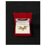 Avon gold tone Angel necklace w/red gemstone,