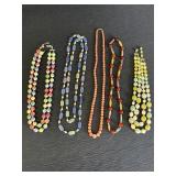 Variety of colorful beaded necklaces, 2 are double