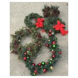 Variety of Christmas wreathes, garland, & pinecone
