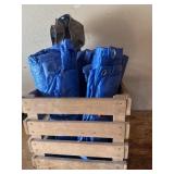 4 tarps in wood crate