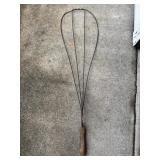 Rug beater w/wooden handle