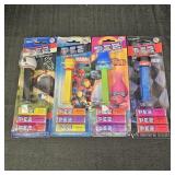 (4) Pez Candy Dispensers: Sox, Marvel, Trolls, &