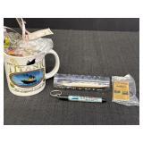 4 Titanic commemorative items - Coffee mug, & 3