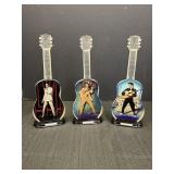 3 collectible guitar-shaped figurines from the