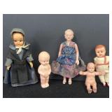 Variety of miniature dolls