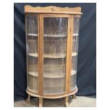 Curved glass curio cabinet with 3 wood shelves