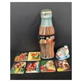 Coca-Cola coasters, tin can, & snow globe
