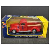 Motor Max 1:24 scale diecast replica of a red
