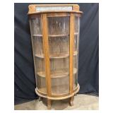 Oak curved glass curio cabinet w/mirror top