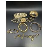 Variety of Gold Tone Bracelets