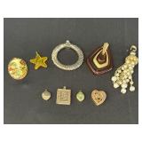 9 chain pendants - 4 are locket type, the brown &