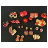 14pr red, peach, mauve pierced earrings,