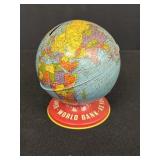 4.75" Tin litho World Globe coin bank was made by