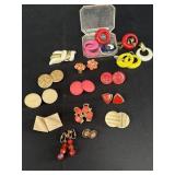 Variety of cream, coral, & misc clip-on earrings,