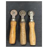 3 wooden-handled tire repair stitchers