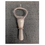 Cast Iron pocket bottle opener 3in long
