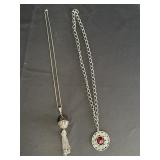 2 silver tone necklaces w/pendants - sphere with