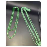 2 green beaded necklaces, long length, no clasps.