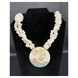 Multi-strand white seashell cluster necklace with