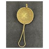Woven brass tea stainer