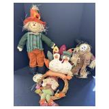 Fall decor - scarecrows, wreath, turkeys.
