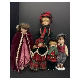 5 porcelain dolls, 3 Marian Yu Designs.  3/5 are