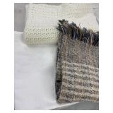 Afghan, knitted blanket & white floral bedspread