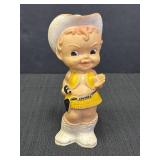 Vtg rubber squeak toy doll styled like a cowgirl,