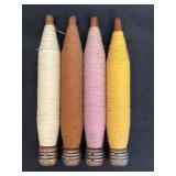 4 vtg wooden textile bobbins w/ yellow, purple,