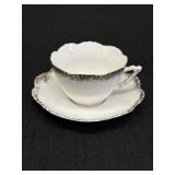 Teacup & saucer set w/delicate scalloped edges &