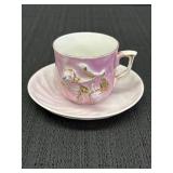 Pink lusterware teacup & saucer w/dimensional