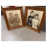 2 oak framed portraits