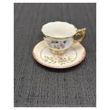 Demitasse cup & saucer, floral motif, cup has gold