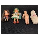 (4) Small figurine dolls, 2 rubber & 2 plastic