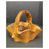Hand-carved burl wood basket likely used as a