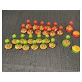 24 wood painted-face round top game pieces & 4