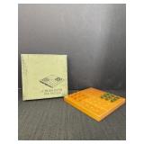 Cross Over Peg Puzzle