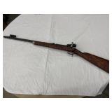 Muzzleloader with Olympic scope