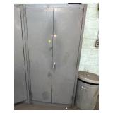 2 Door metal cabinet, contents not included