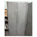2 Door metal cabinet, contents not included